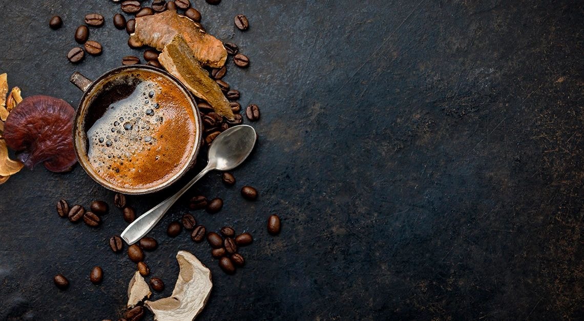 Espresso coffee with ganoderma mushrooms artisanal flat lay